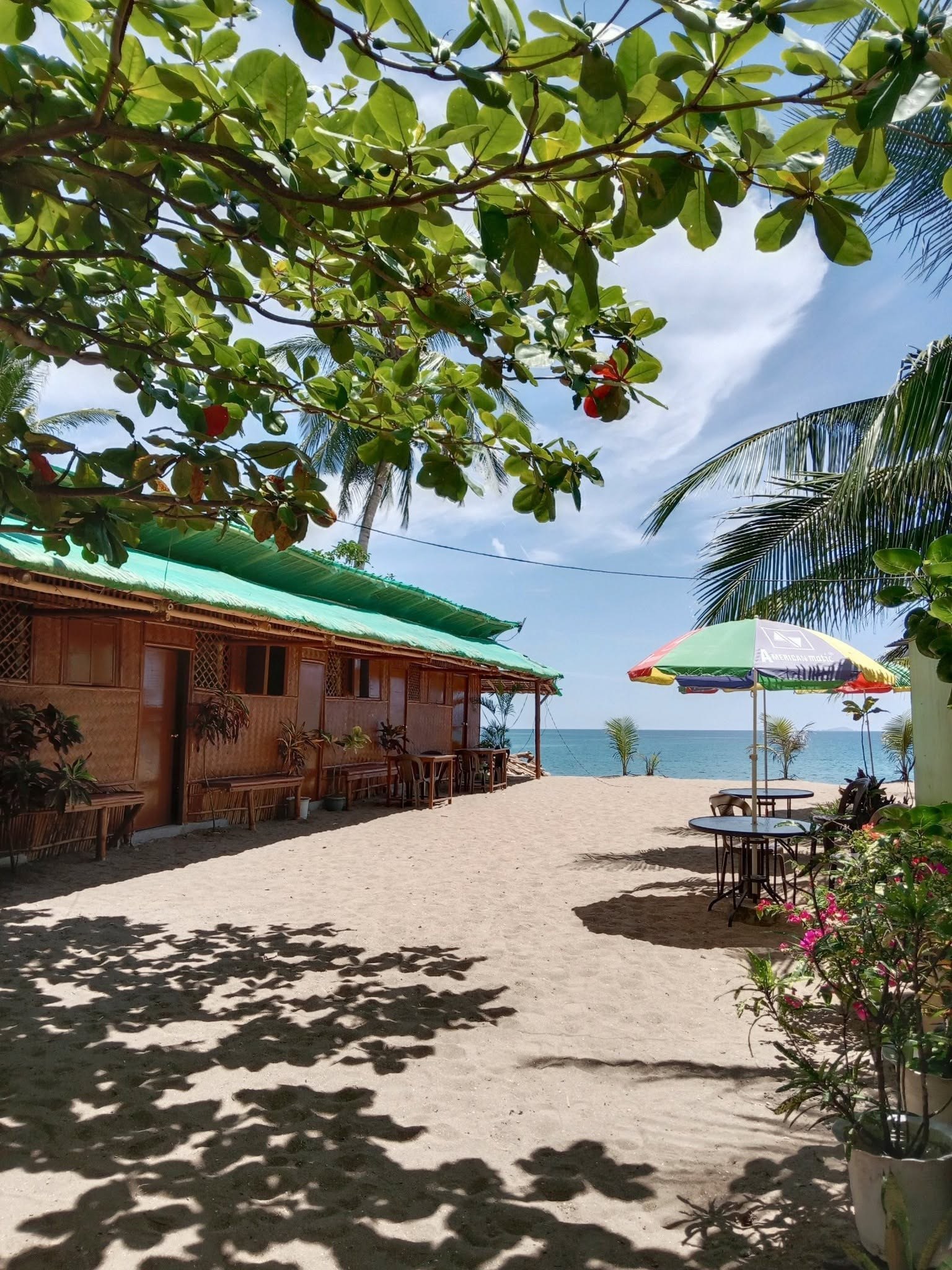 Beachfront cabanas at sunset